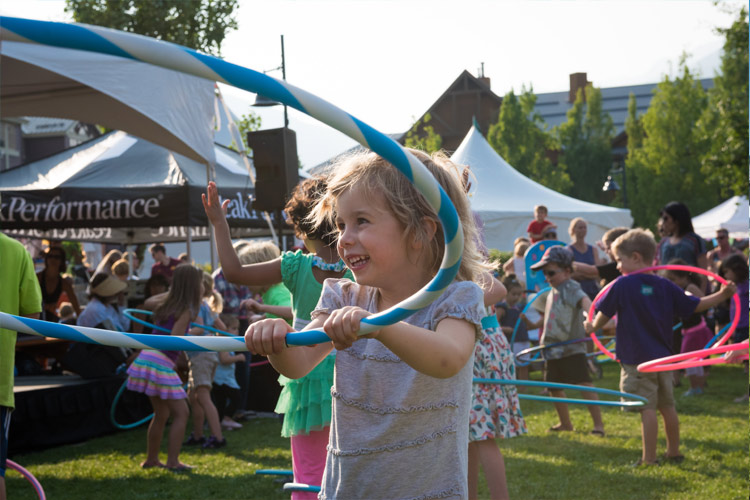Child hula hooping at the Whistler Childrens Festival